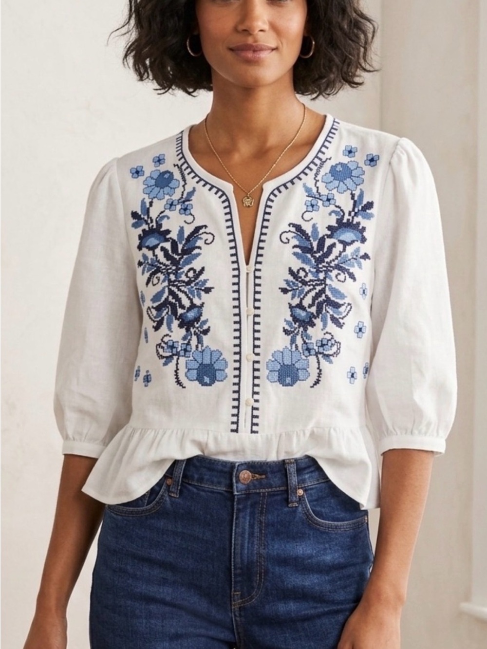 Solitaire White Peplum Blouse with Blue Floral Embroidery